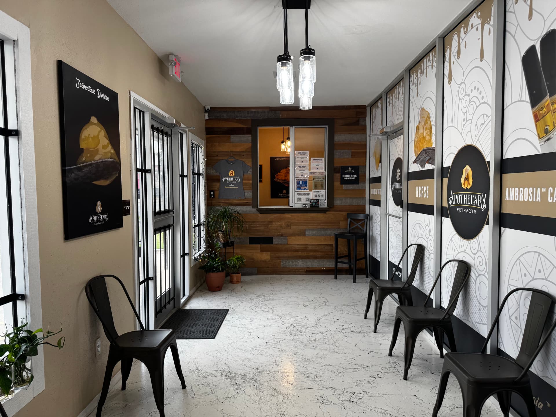 Apothecary Farms Durant lobby with Ambrosia and Solventless Division wall graphics