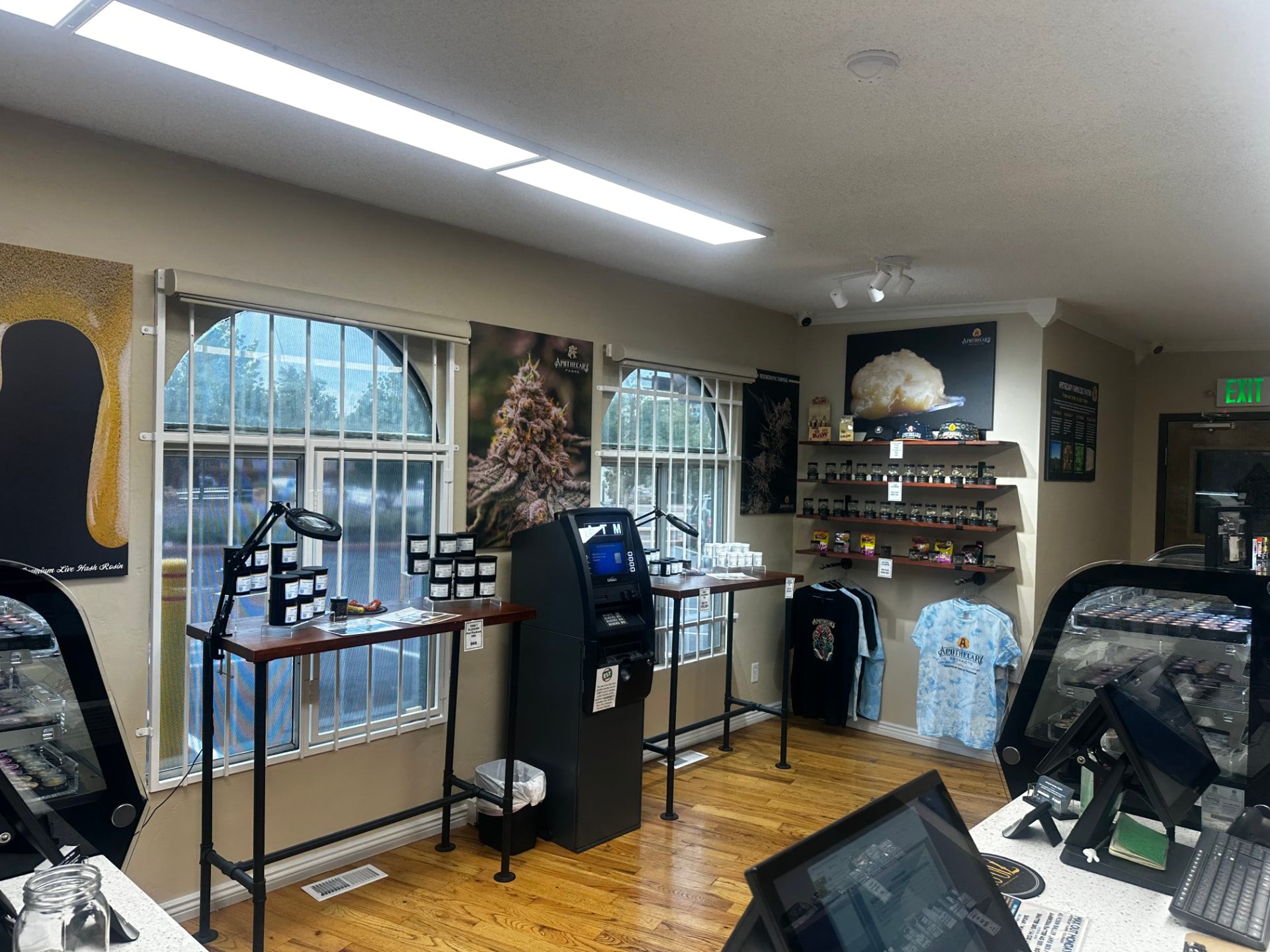 Apothecary Farms Colorado Avenue lobby with product displays, merch wall and ATM