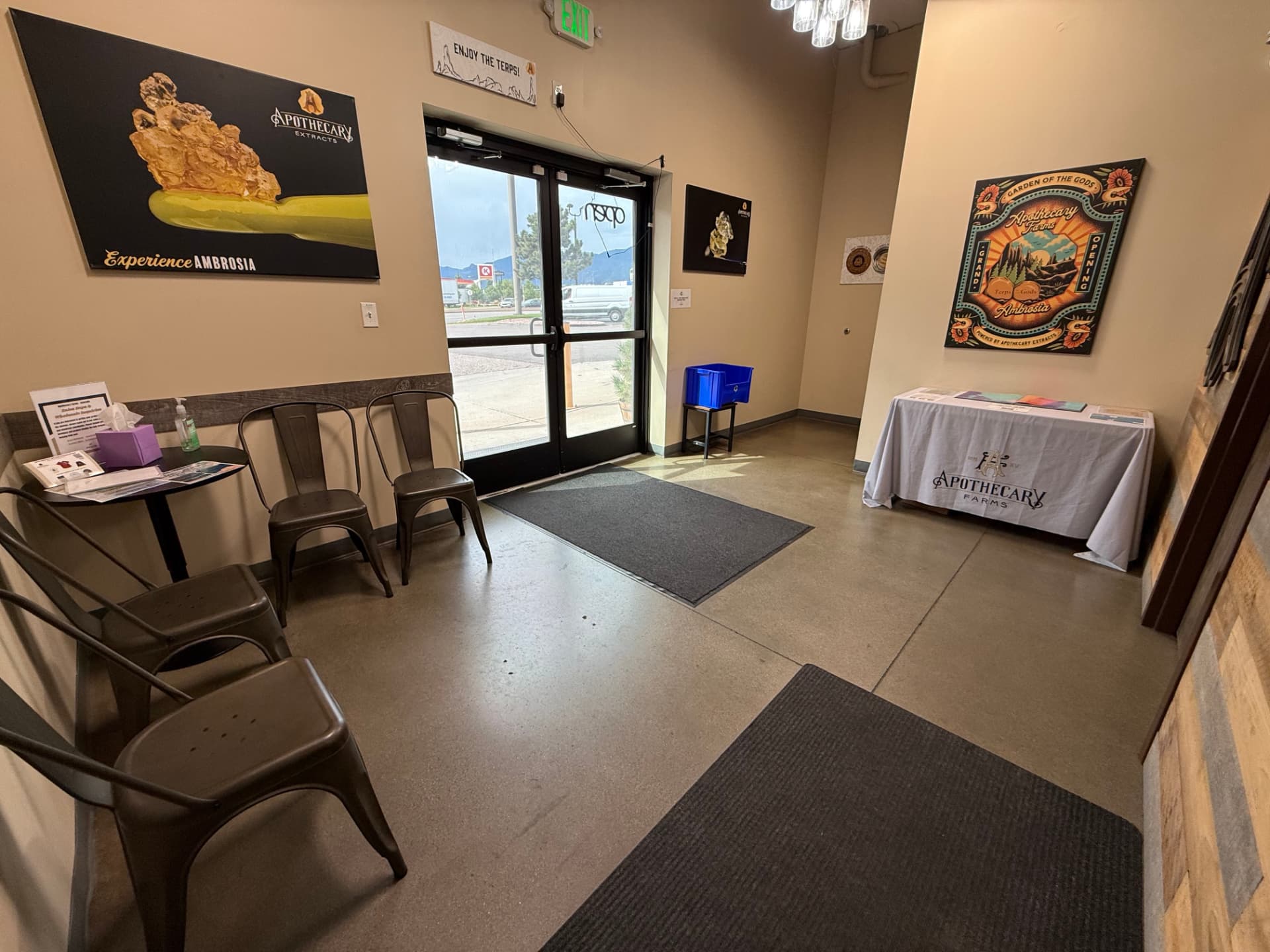 Apothecary Farms Garden of the Gods lobby with Experience Ambrosia artwork and seating