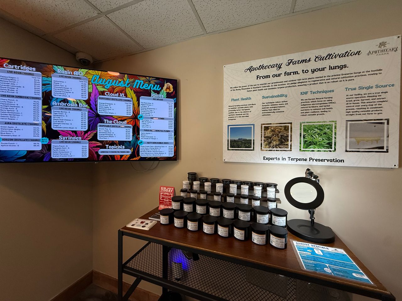 Apothecary Farms Federal menu boards and cultivation story wall with terp jar display