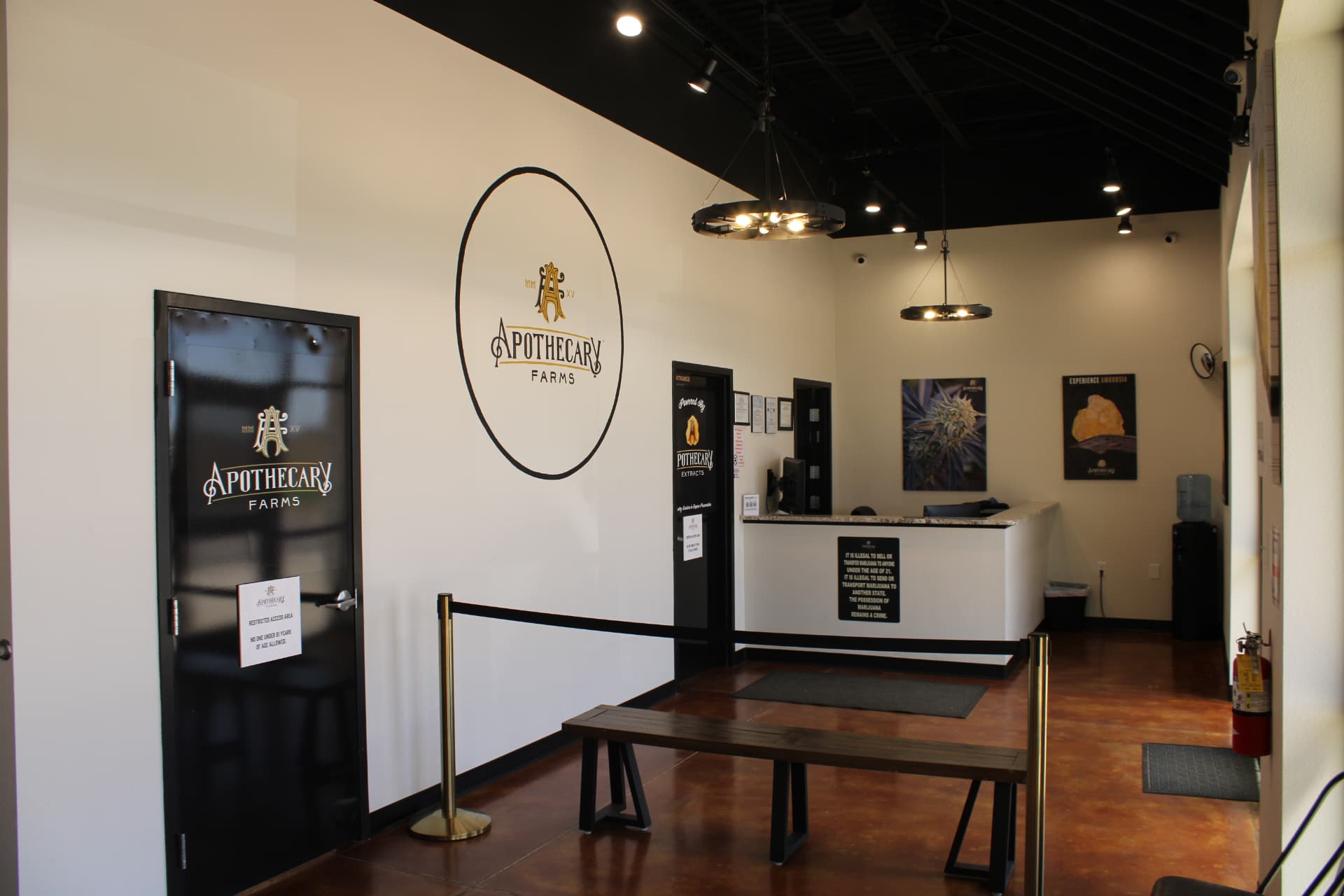 Apothecary Farms Pueblo West lobby with logo wall and check-in counter