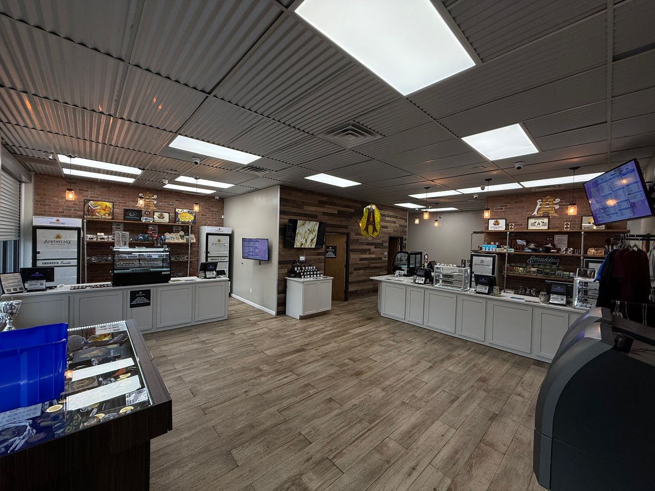 Apothecary Farms South Broadway sales floor with counters, cases and digital menus