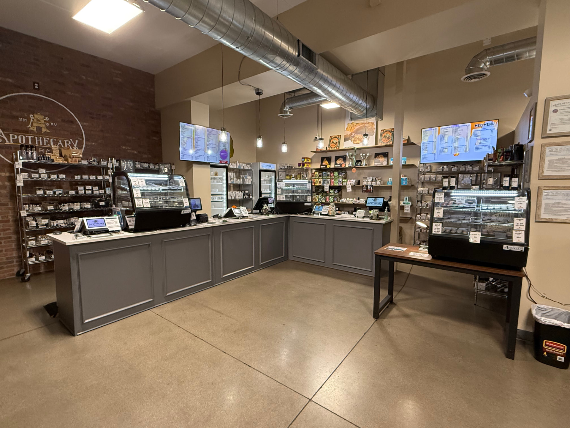 Apothecary Farms Garden of the Gods sales floor with counters, cases and digital menus